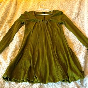 Nice fall to winter dress. Allowing a little bosom to show, just a little.